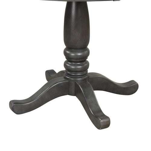 Close-up of a dark wood pedestal table base with curved legs, classic design
