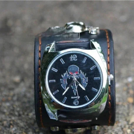 Black wide leather cuff watch with silver case, skull motif dial, rugged streetwear accessory