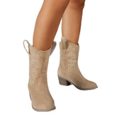 Beige suede western cowboy boots with embroidered detail, block heel, and mid-calf fit