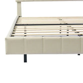 Beige upholstered bed frame with wooden slats and metal legs, modern minimalist design