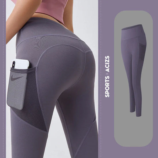 High-waisted purple athletic leggings with side pocket, slim fit, stretch fabric design.