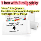 Three rolls of white thermal printer sticker paper with black lettering, adhesive backing