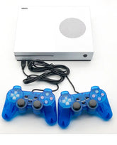 White gaming console with circular vent and two wired blue transparent controllers on white background
