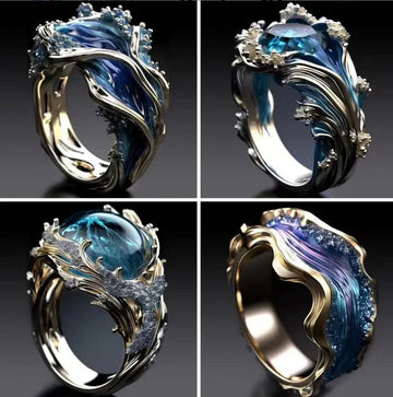Unique silver and blue statement rings with wave-inspired, sculptural designs and crystal accents.
