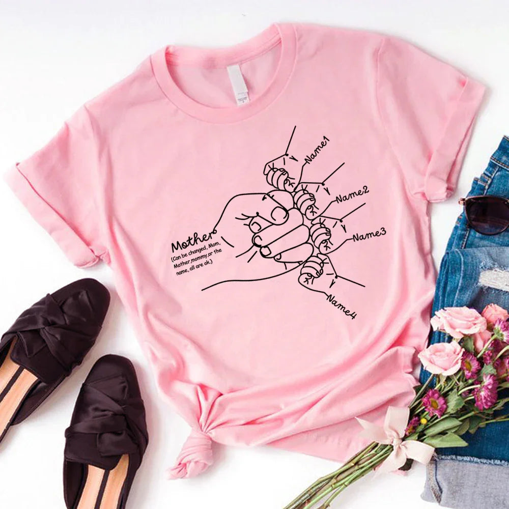 Light pink cotton t-shirt with minimalist family hand graphic and customizable names, relaxed fit.