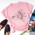 Light pink cotton t-shirt with minimalist family hand graphic and customizable names, relaxed fit.