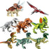 Assorted colorful plastic dinosaur figurines on white background, including Triceratops and T-Rex.