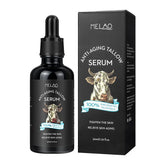 Black anti-aging tallow serum bottle and box with cow graphic, skincare product