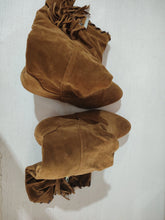 Brown suede boots with fringe detailing and relaxed fit