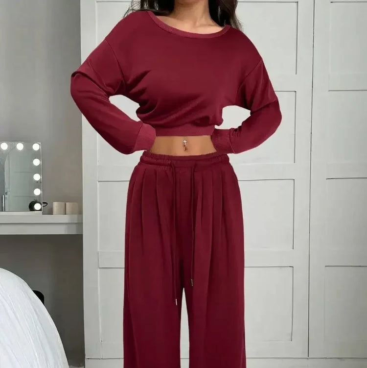 Woman wearing maroon long sleeve crop top and wide-leg pants lounge set, relaxed fit