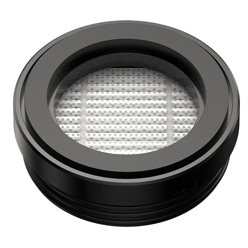 Black circular water filter cartridge with visible white ceramic filter element