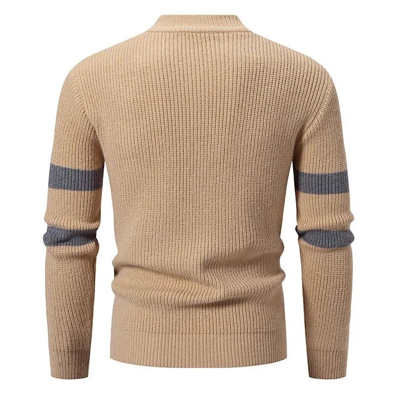 Beige knit sweater with gray arm stripes, ribbed texture, slim fit, long sleeves.