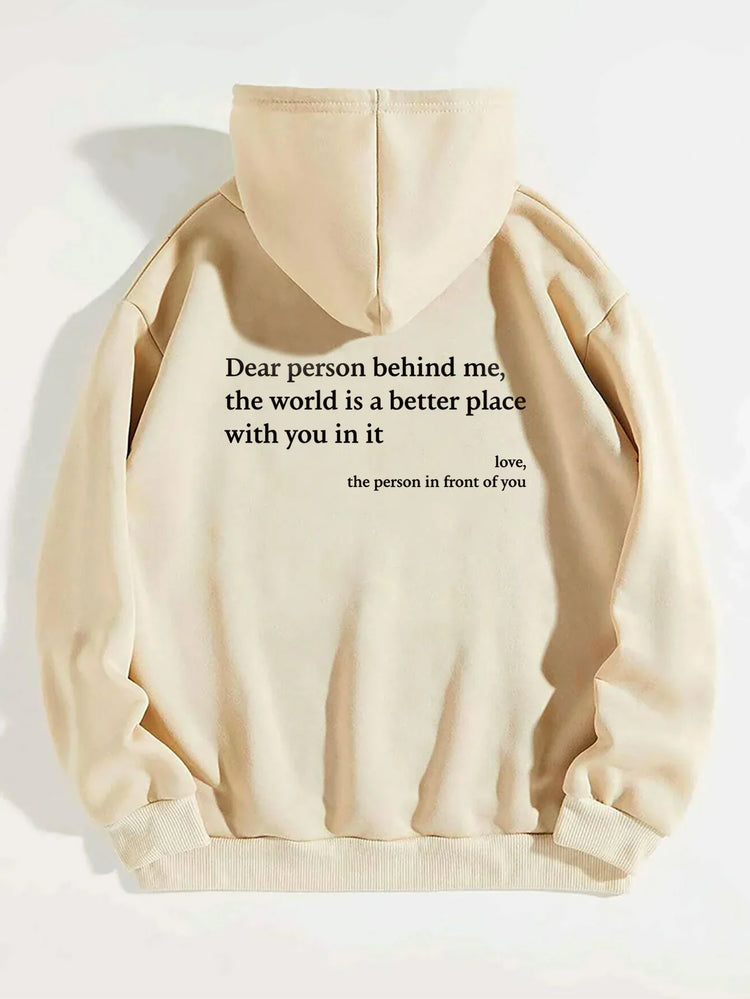 Beige fleece hoodie with black inspirational text on back, relaxed fit streetwear style