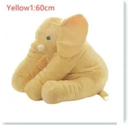 Soft yellow plush elephant toy with floppy ears and smooth fabric, medium-large size, sitting pose.