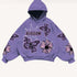 Purple oversized hoodie with butterfly and flower graphics, soft fabric, relaxed fit.