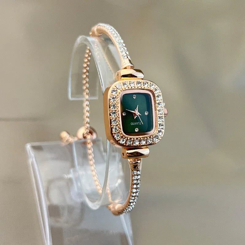 Elegant rose gold bracelet watch with green square face and crystal accents, slim fit