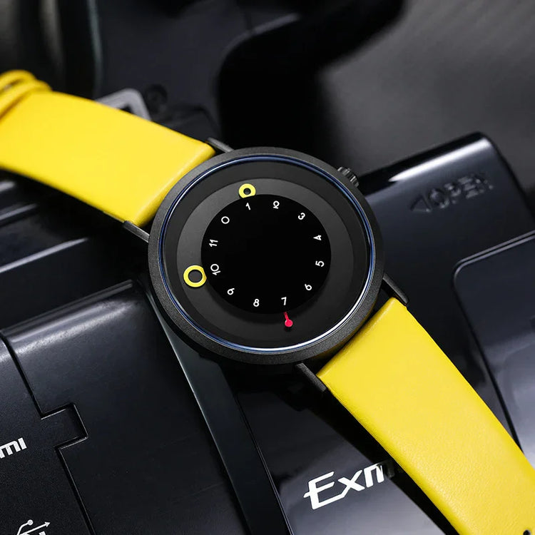 Modern black watch with minimalist dial and bright yellow leather strap, futuristic style.