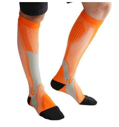 Orange and gray knee-high compression socks with black toes and heels, sporty fit