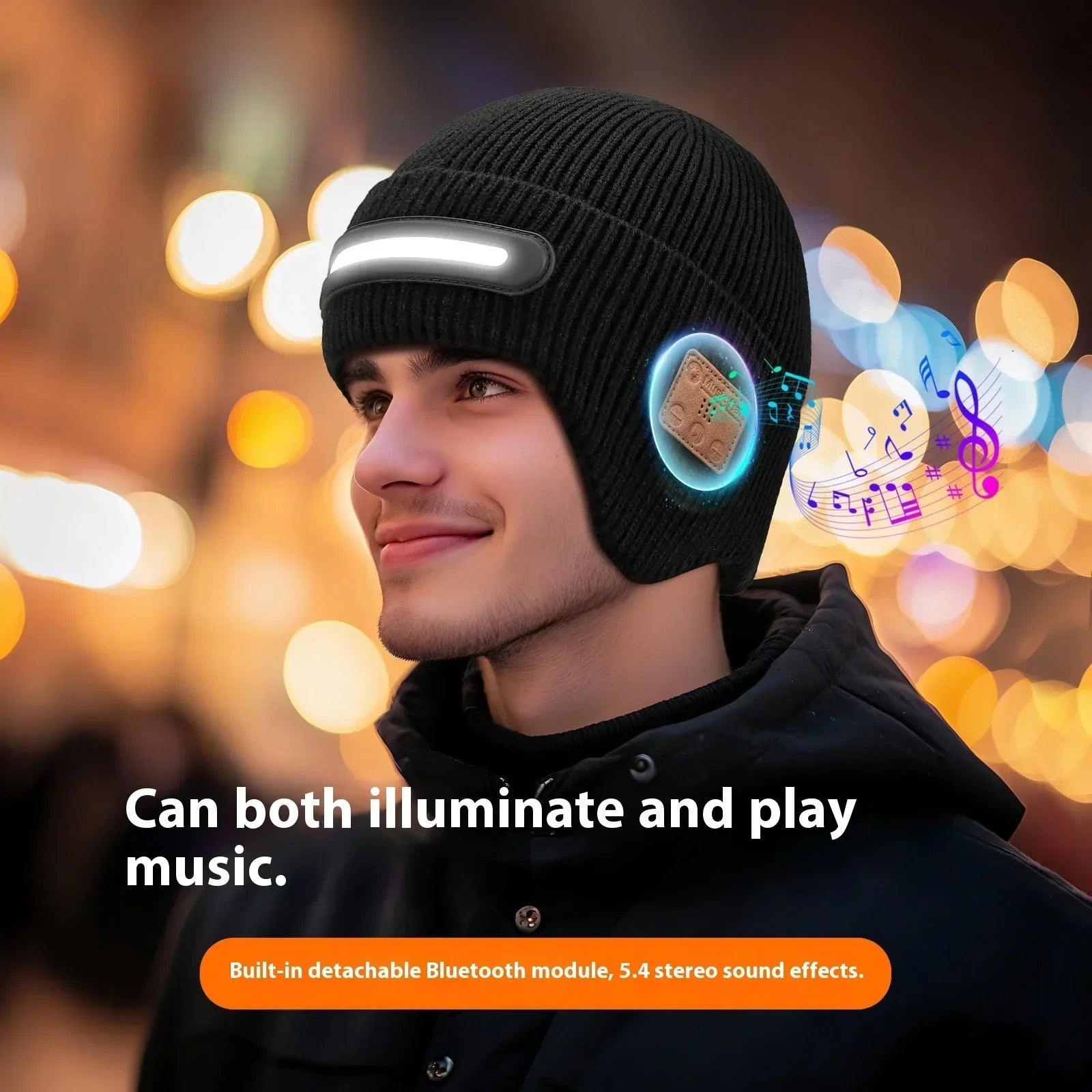 Man wearing black ribbed knit beanie with LED light and Bluetooth headphones in urban night setting