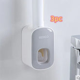 Modern wall-mounted gray and white plastic dispenser for kitchen or bathroom organization