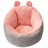 Plush pink and gray round lounge chair with soft fleece material and bear ear accents