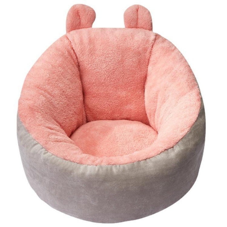 Plush pink and gray round lounge chair with soft fleece material and bear ear accents