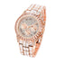 Rose gold watch with crystal-studded face and band, luxury style, metallic finish