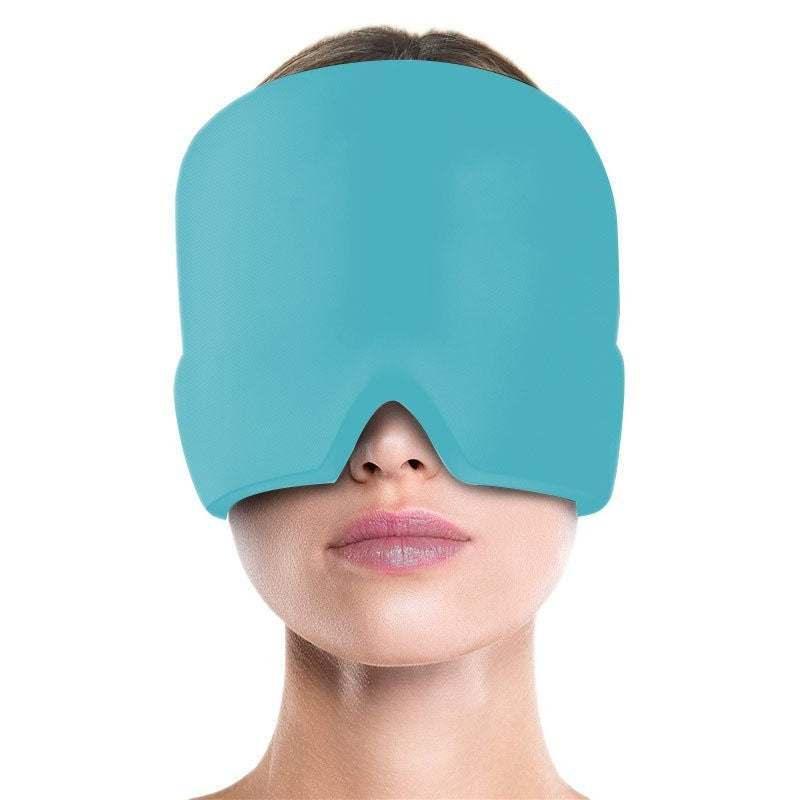 Woman wearing oversized blue futuristic eye mask with smooth matte finish, snug comfortable fit