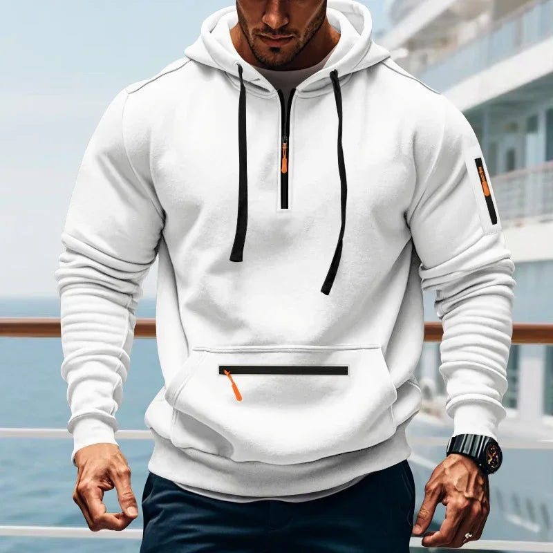White zip-up hoodie with black drawstrings and orange accents, athletic fit, outdoor setting