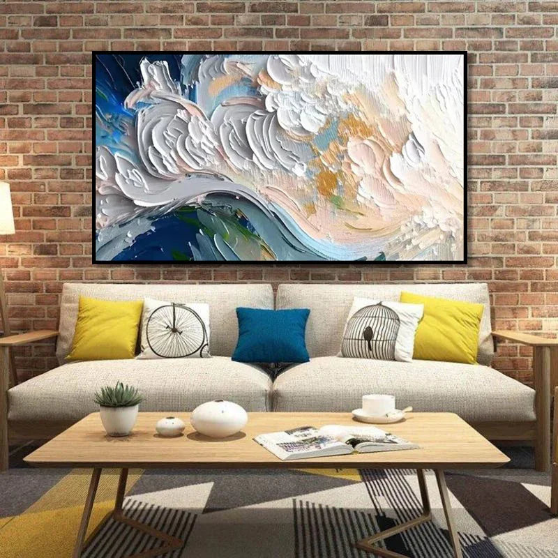 Modern living room with neutral fabric sofa, colorful accent pillows, and abstract wall art