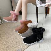 Faux fur lined winter boots in pink, brown, grey, and black suede with flat white soles