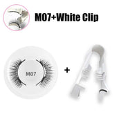 Black synthetic false eyelashes with natural volume, paired with a white plastic application clip.