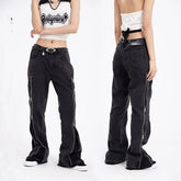 Loose fit black denim pants with side zippers, straight-leg cut, worn by a model.