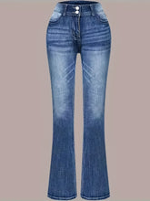 High waisted blue denim flare jeans with double button closure and subtle fading