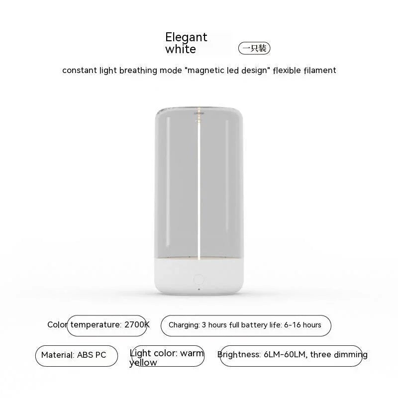 Minimalist white LED lamp with warm yellow light, ABS plastic, sleek cylindrical design.