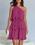 Woman wearing a magenta one-shoulder pleated dress with tiered ruffle layers, relaxed fit