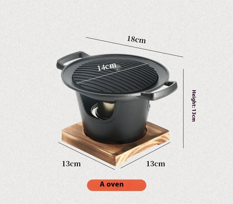 Compact black tabletop grill oven with metal grate, wood base, and size measurements displayed.