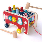 Colorful wooden hammering and gear toy shaped like a red elephant for kids