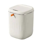 Modern white rectangular storage bin with smooth glossy finish and orange pull tab