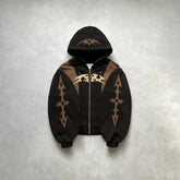 Brown and black streetwear hoodie with bold graphic details and relaxed oversized fit