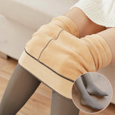Beige fleece-lined skirt paired with sheer gray tights, soft material, slim fit