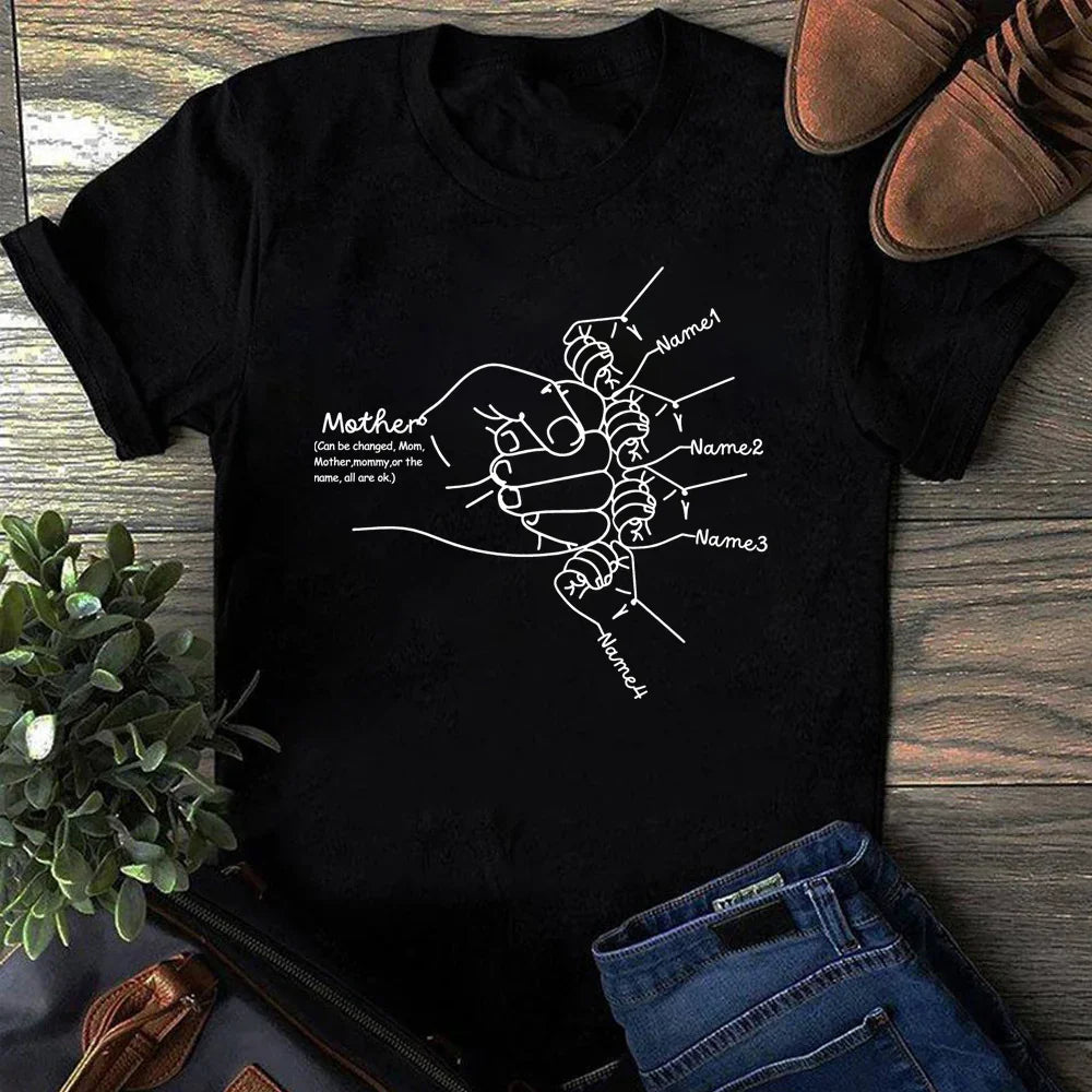 Black graphic tee with white line art of a mother holding children&