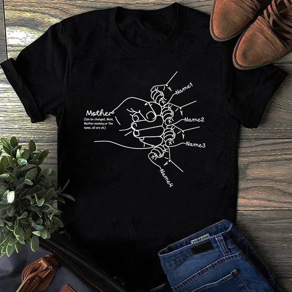 Black graphic tee with white line art of a mother holding children's hands, customizable text, unisex fit.