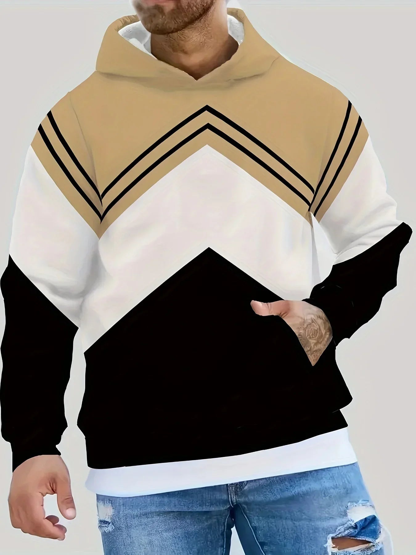 Men's streetwear hoodie with tan, black, and white colorblock design, relaxed fit, cotton blend
