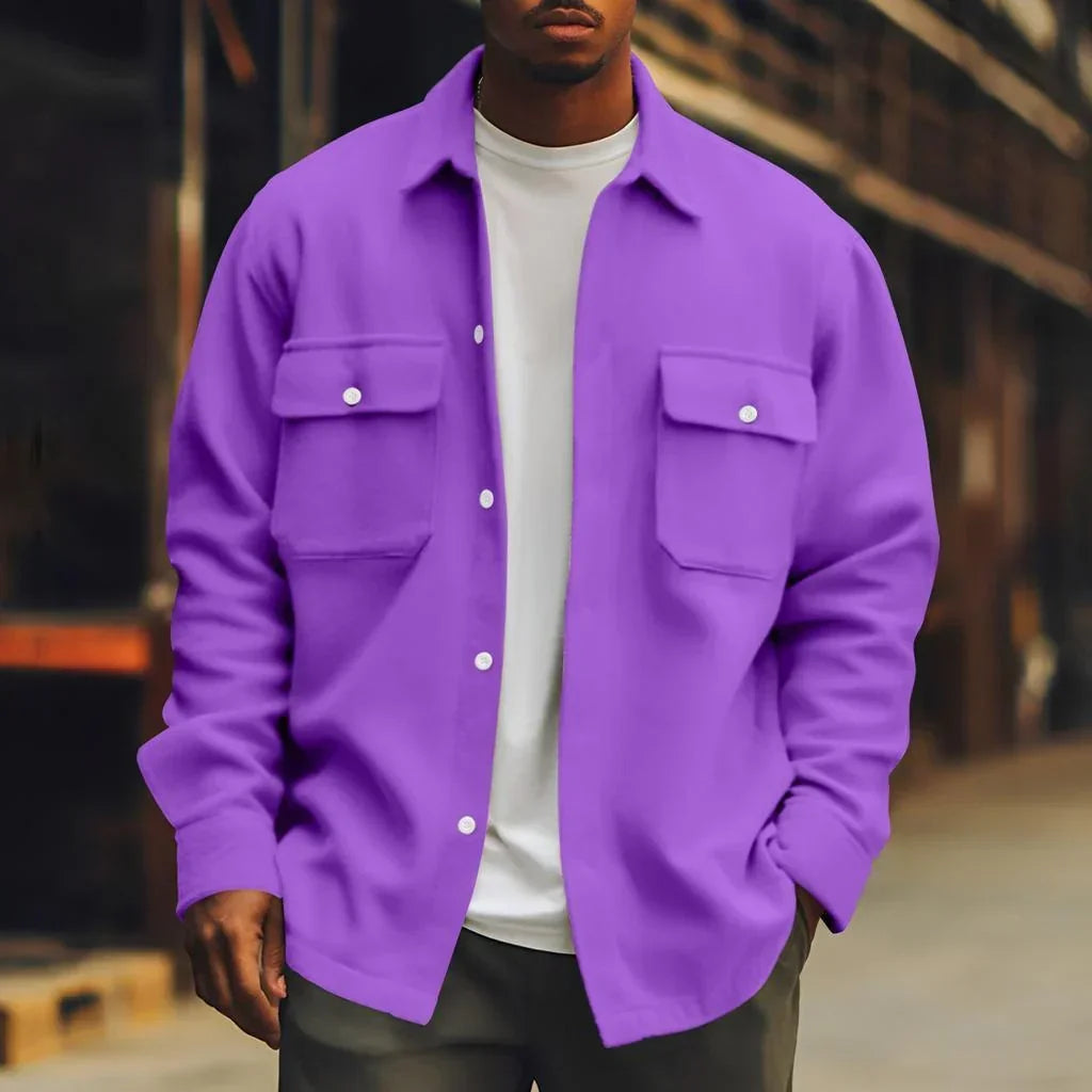 Man wearing a relaxed-fit purple button-up overshirt with chest pockets and white tee