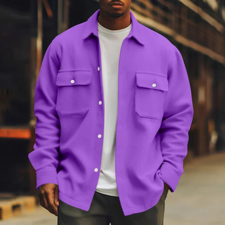 Man wearing a relaxed-fit purple button-up overshirt with chest pockets and white tee