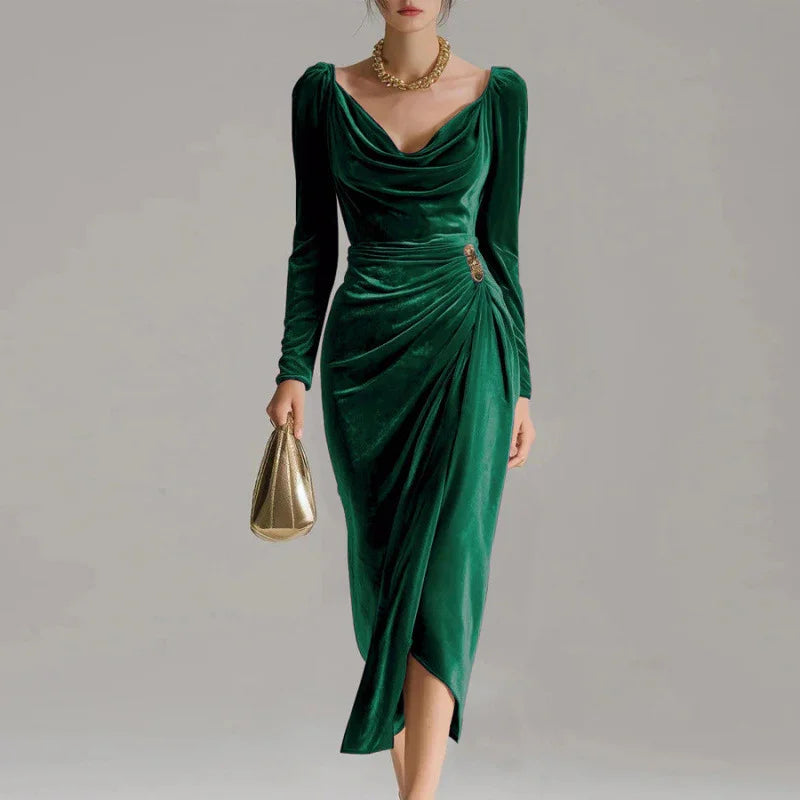 Elegant green velvet dress with long sleeves, draped neckline, slim fit, and ruched waist detail
