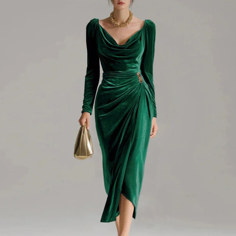 Elegant green velvet dress with long sleeves, draped neckline, slim fit, and ruched waist detail