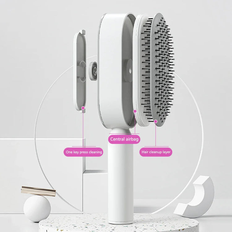 White ergonomic hairbrush with one-press cleaning and airbag tech, shown in exploded view.