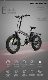 Gray electric mini bike with fat tires, foldable frame, and spring front suspension on display.